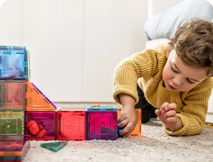 Working with Great Little People on refrigerator  magnets and printed whiteboards
